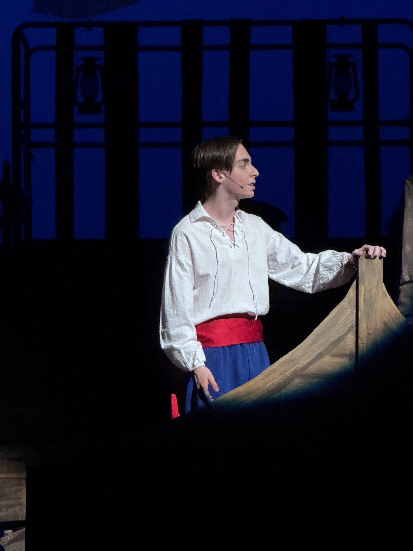 Van in a blue cape costume